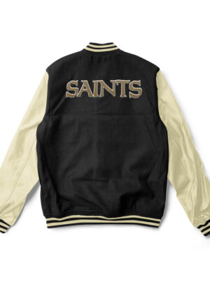 A Black and off white New Orleans Saints varsity jacket with off white trim and a large team logo patch on the back