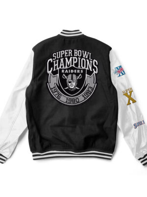 A Black and white Oakland Raiders varsity jacket with white trim and a large team logo patch on the back
