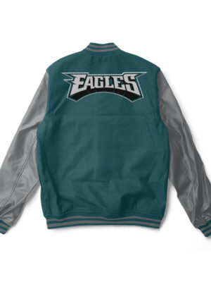 A green and grey Philadelphia Eagles varsity jacket with grey trim and a large team logo patch on the back