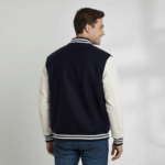 Varsity Vogue Letterman: Navy Blue Varsity Jacket with White sleeves Varsity Vogue
